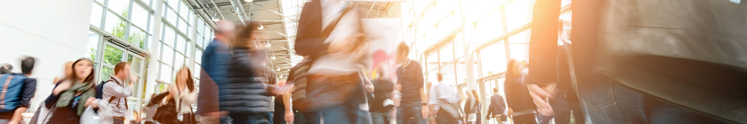 blurred business people at a trade fair